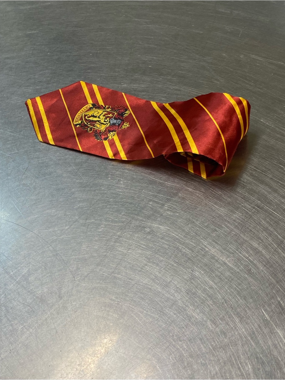 Disguise Maroon Tie with Yellow Stripes and Crest
